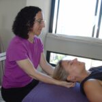 Christine Brusati applying integrative massage therapy