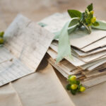 flowers on pile of letters, flower letter, envelope, lettter, romantic letter