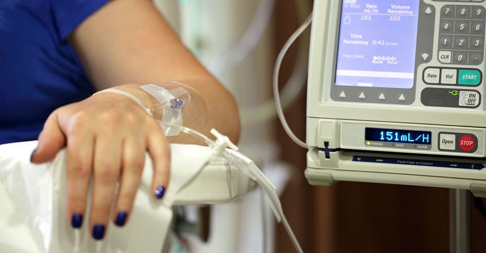 Woman receiving cancer therapy