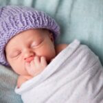 swaddled infant