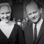 A photograph of Sister Cathy standing next to a Catholic official in the documentary The Keepers