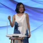 Yoko Sen presents her sound research at a conference