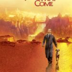 The official poster of the film "What Dreams May Come," showing Robin Williams walking next to a dog in an orange background.
