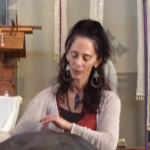 Deb playing her music