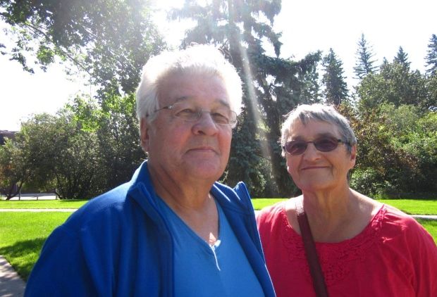 Adele Fontaine and her husband Norman standing in a park.