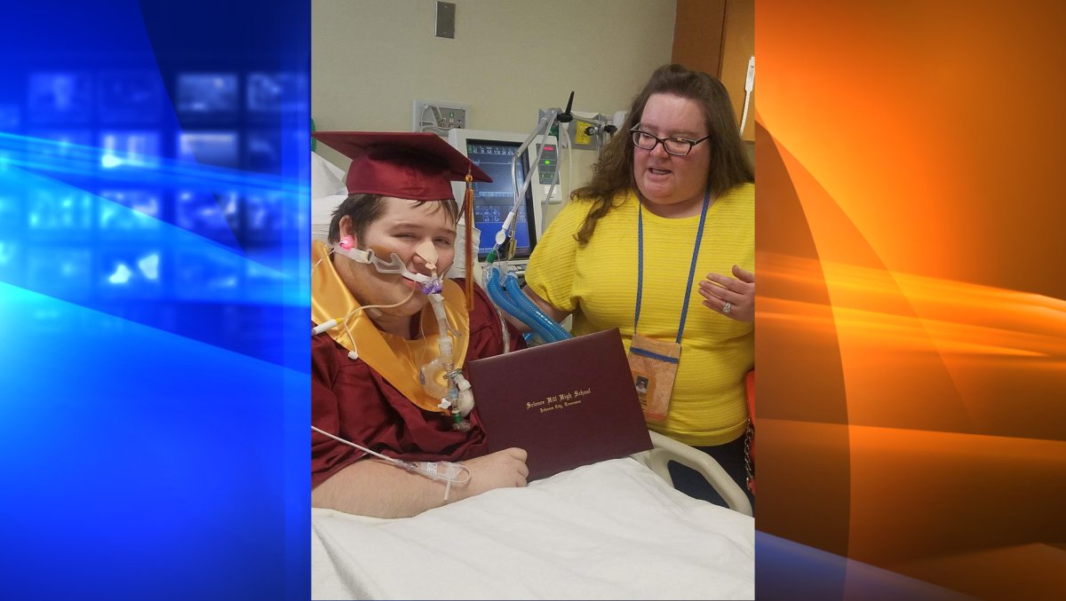 Dakota Johnson posing with this high school diploma.