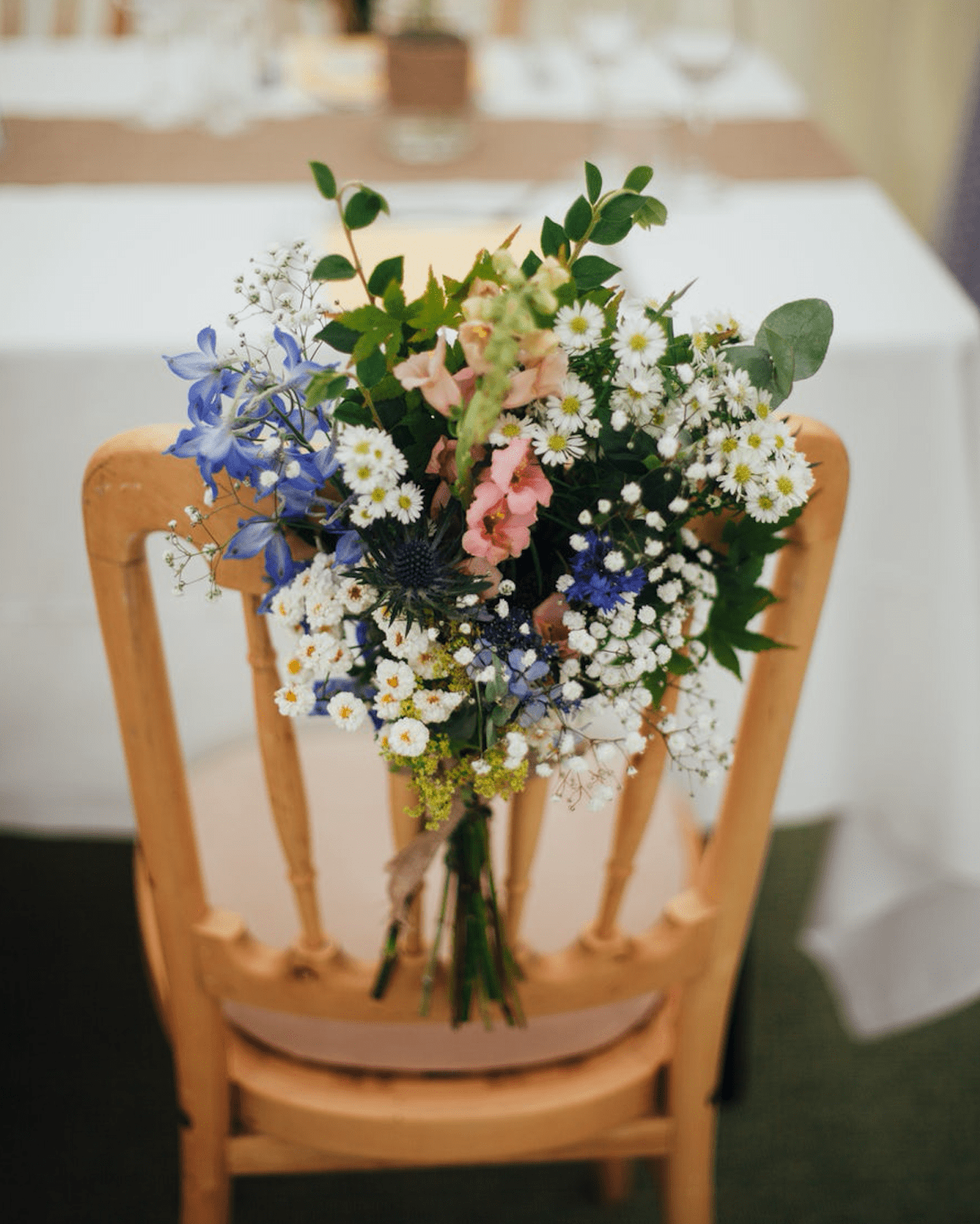 Image of a chair with flowers to decorate a place setting