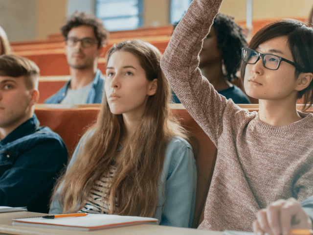 College students in a death class look intent