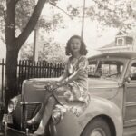 Mom at around 18 sitting on car hood sm