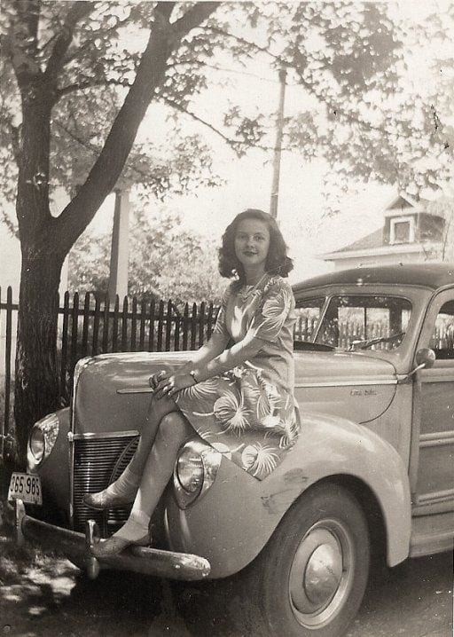 Mom at around 18 sitting on car hood sm
