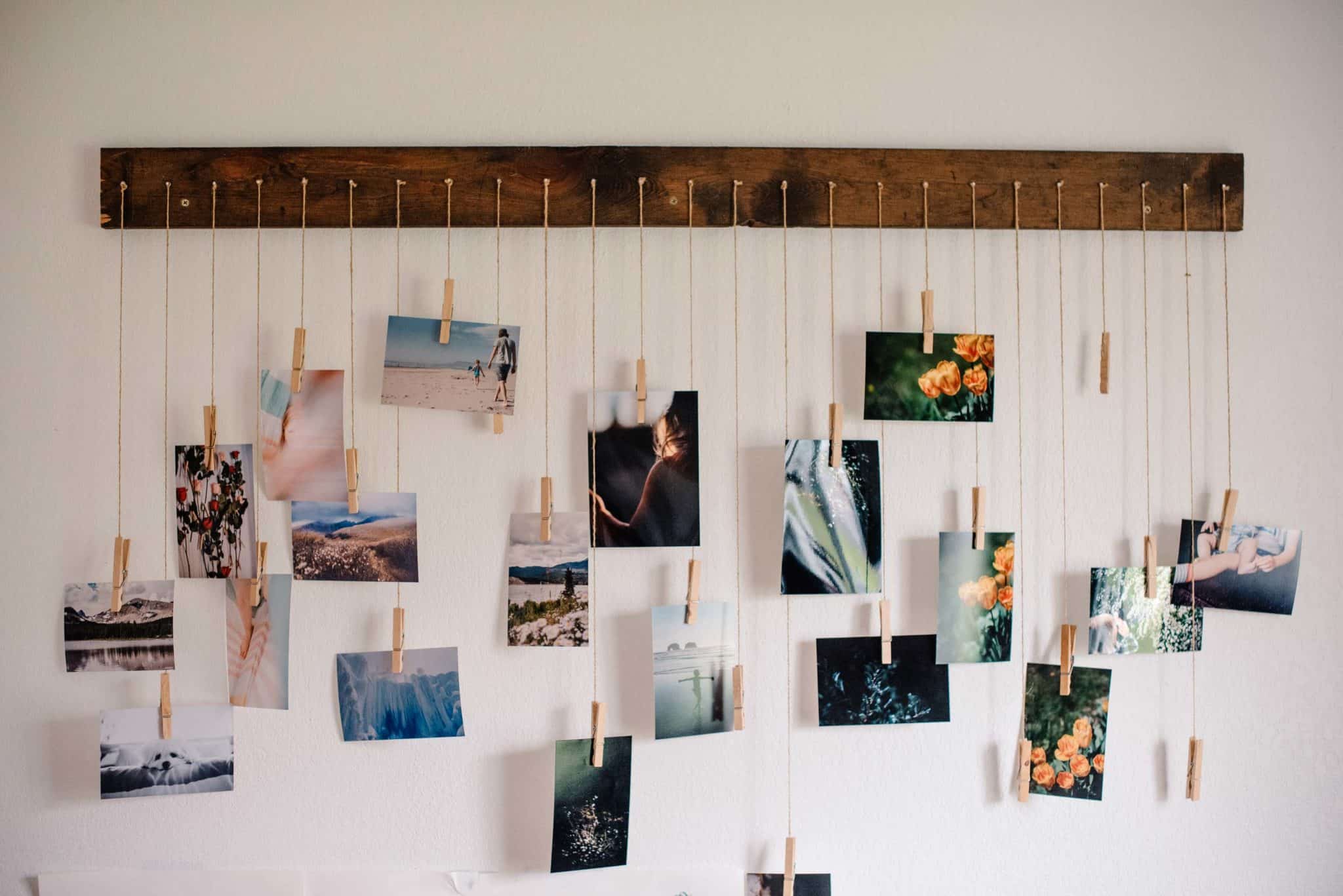 Our Monthly Tip: Display Your Loved One’s Life Through a Hanging Photo CollageDIY ahead of time, and allow guests to add their own items