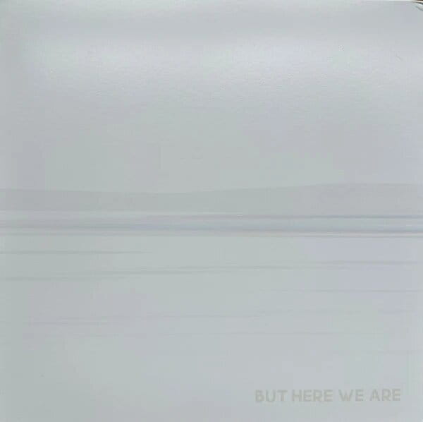 Foo Fighters’ But Here We Are album cover, featuring a minimalist white and gray design with the album title in the lower right corner.