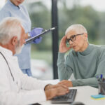 doctor communicates with elderly patient about goals of care