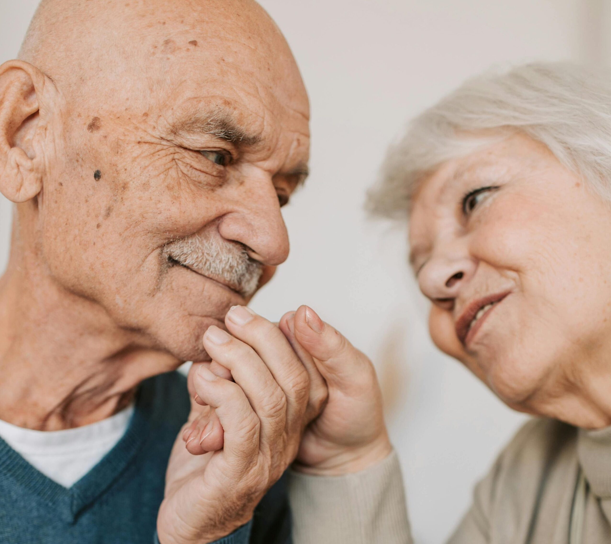 Elderly couple illustrating loving commitment.