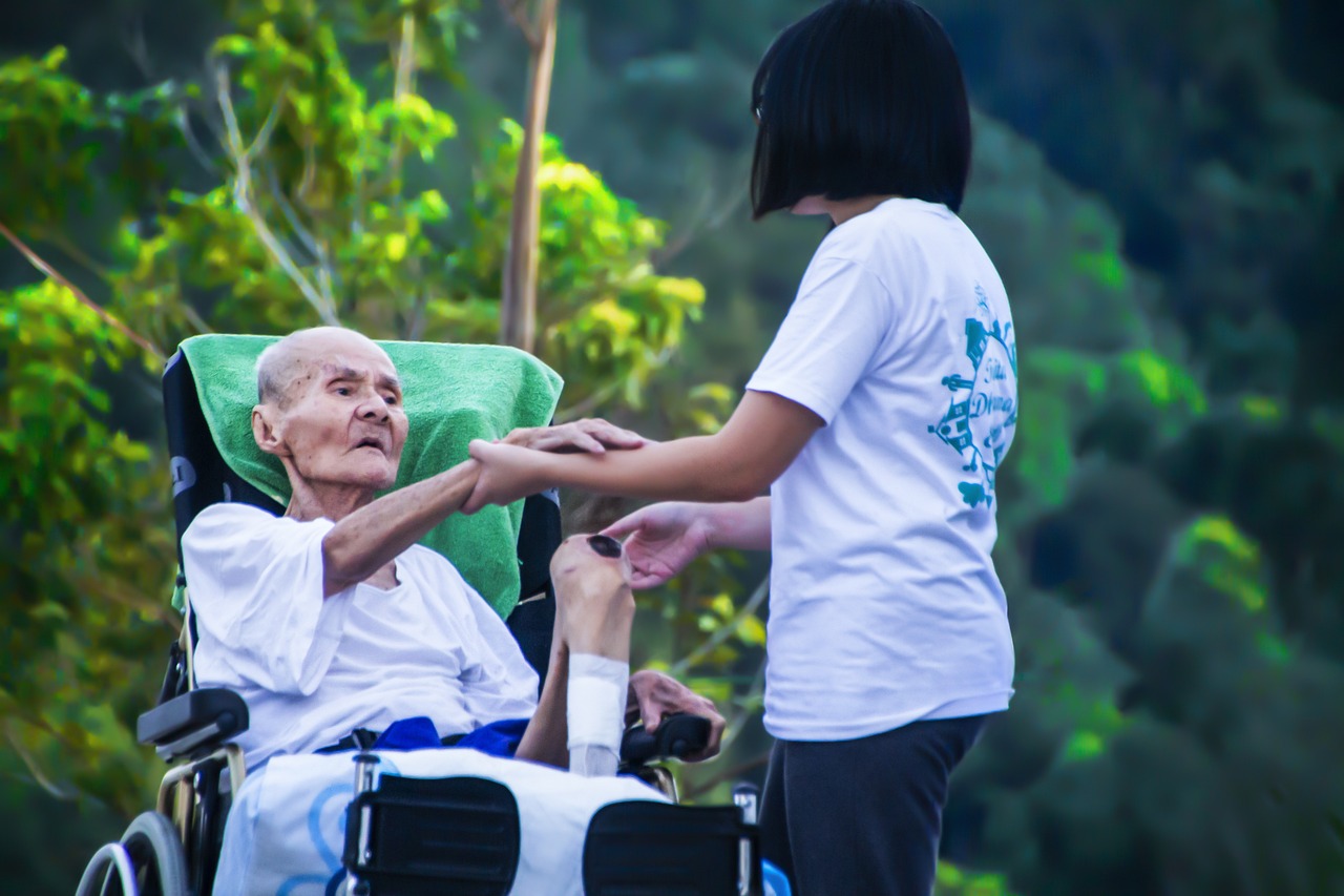 palliative nurse with patient