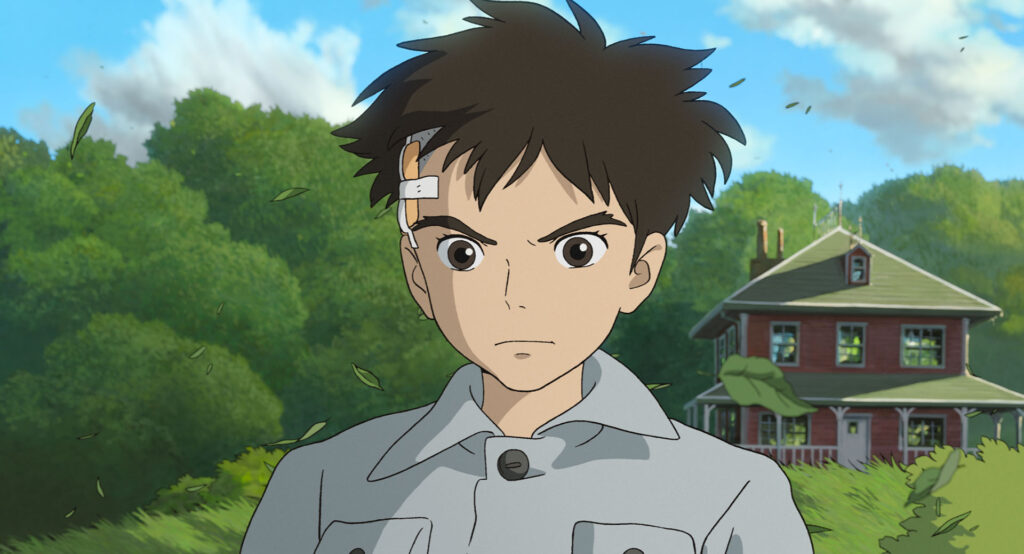 Mahito, the protagonist of the film, looks determined as he starts his journey
