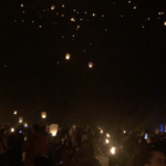 Sky lanterns rise above Little Everglades Ranch at The Lights Fest event.