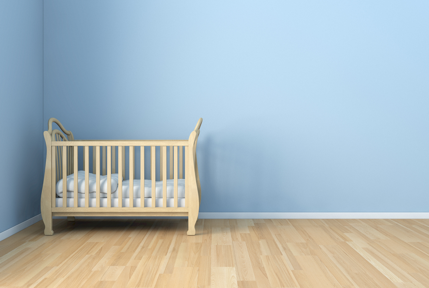 an empty bassinet signifies pregnancy and infant loss