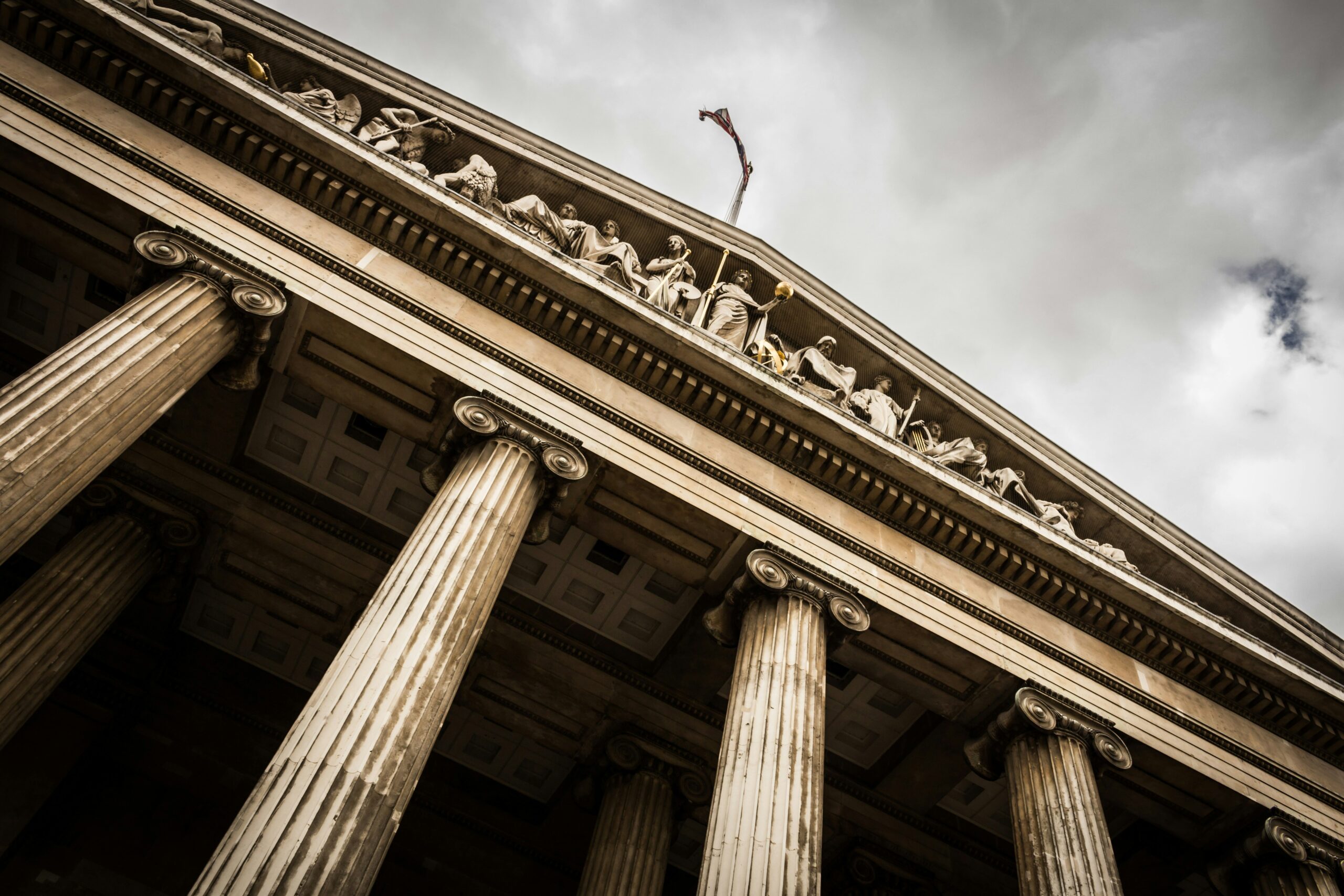 a courthouse with a cloudy sky in the background, showing the legal process for advance directives