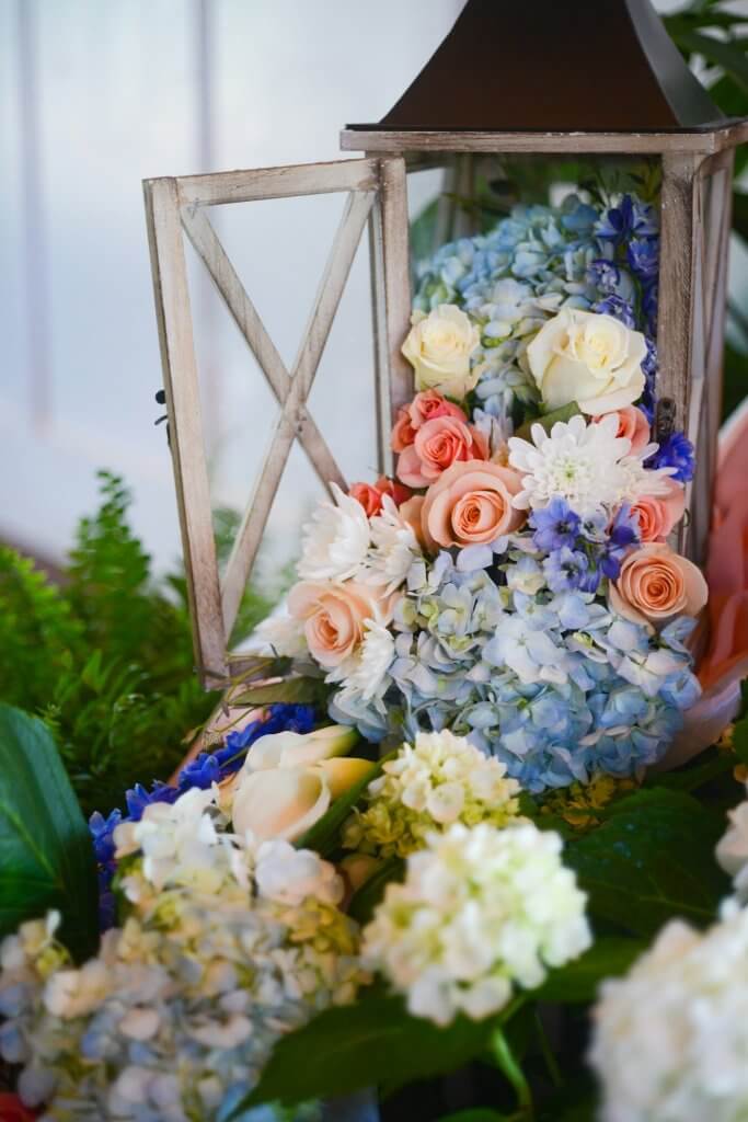 Flowers displayed pouring from a latern at a celebration of life
