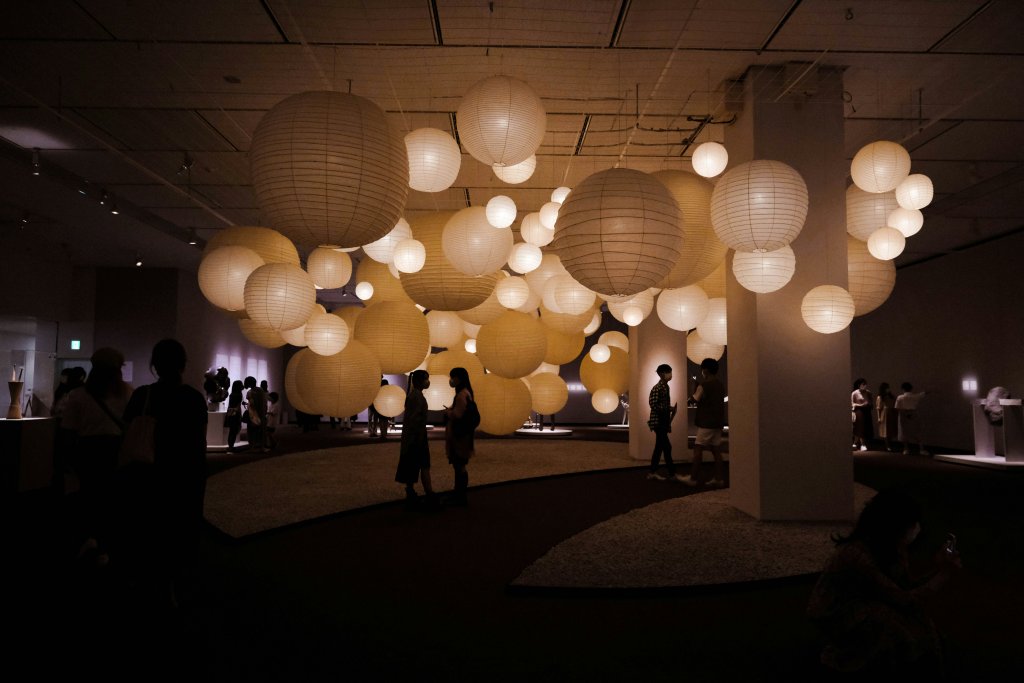 Alternative memorial venue with large paper lanterns and an open event space for a celebration of life