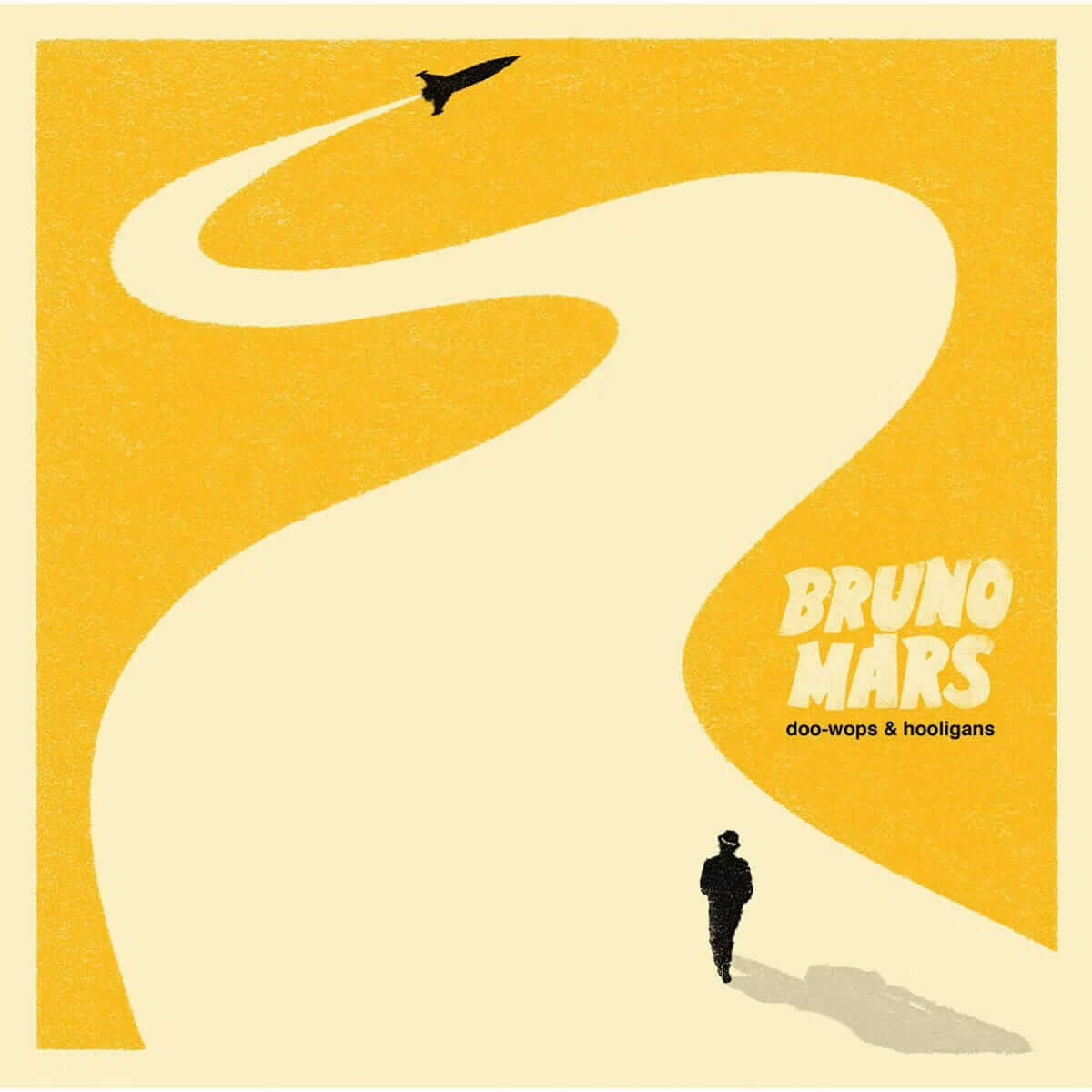 Bruno Mars’ Doo-Wops & Hooligans album cover featuring a yellow background, a winding cream-colored path, a silhouetted figure walking along the path and a black sci-fi rocket ship flying overhead.