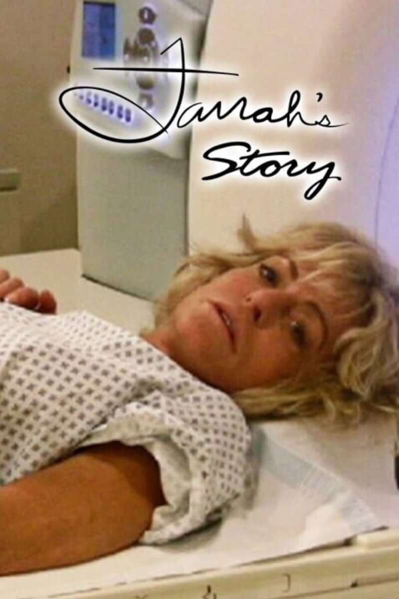 Farrah Fawcett lies in a hospital bed during her battle with cancer.